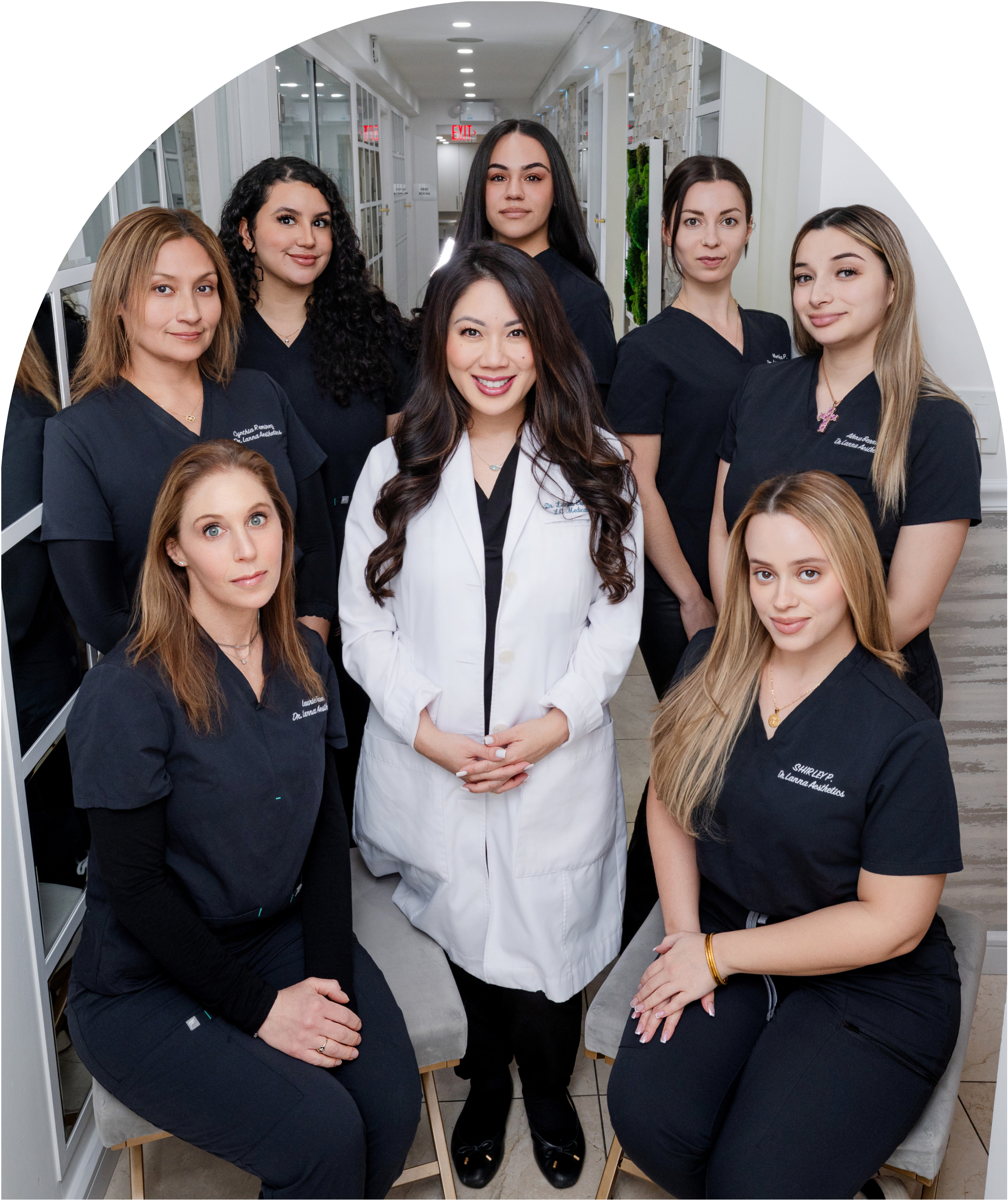 Dr. Lanna Cheuck in a white coat with the LC Medical Aesthetics team at the New York City practice